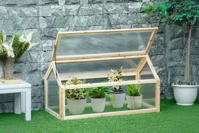 Charming Wooden Cold Frame Greenhouse for Your Garden Paradise