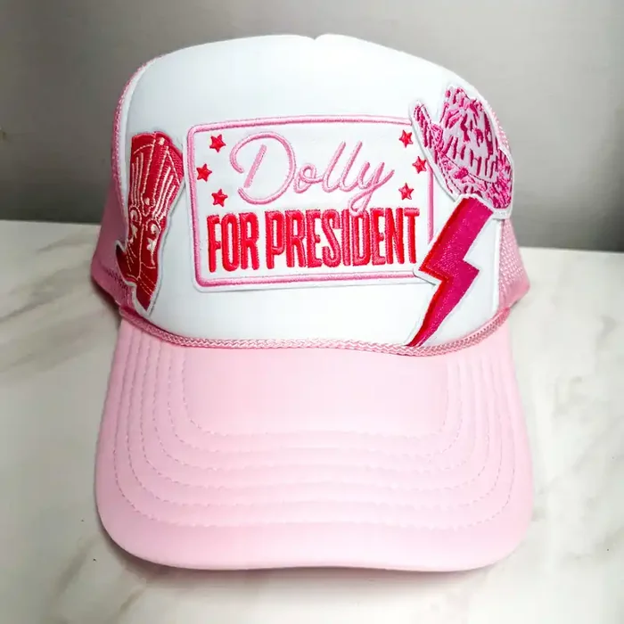 Dolly For President • Multi Patch Trucker Hat • Pink