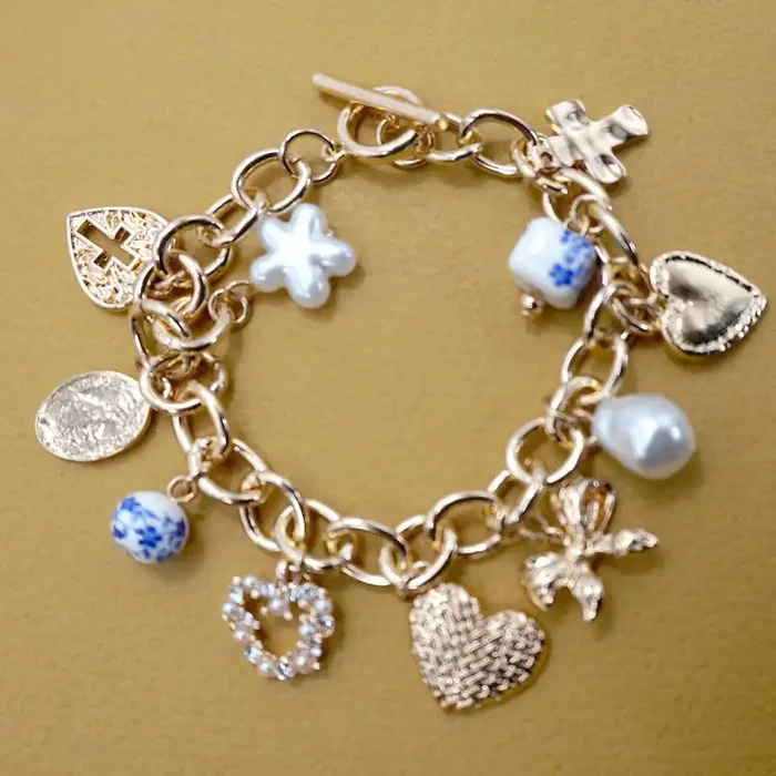 Heart Coquette Bow Cross Multi Charm with Blue Ceramic Porcelain Toggle Bracelet In Gold Plating 7.5″ Long