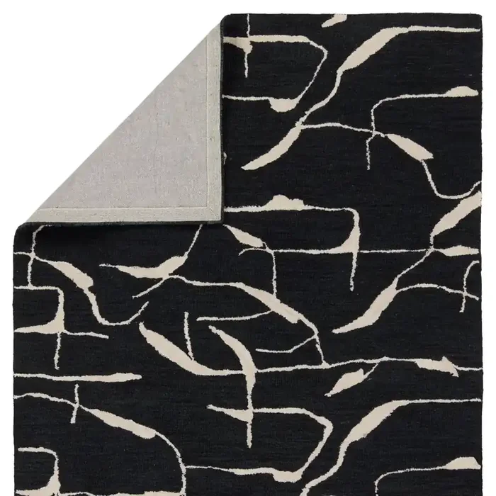 Nikki Chu by Jaipur Living Noir Handmade Abstract Black/ White Area Rug (MALLINO – MNK01)