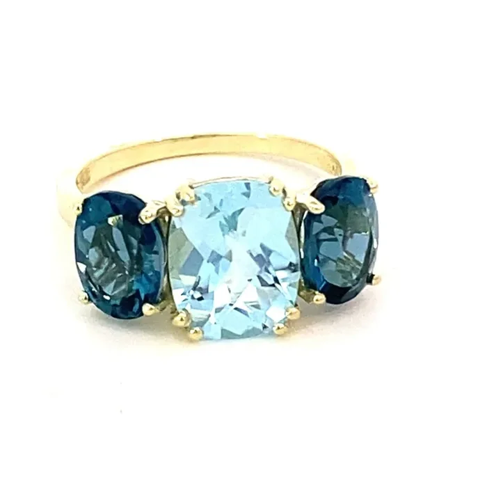 Ring with Sky blue topaz flanked by London blue topaz 14kt yellow gold