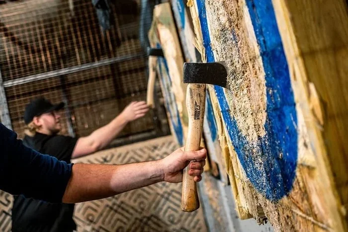 Try Coached or Game-Mode Axe Throwing (For 1–4 People, Ages 13+)